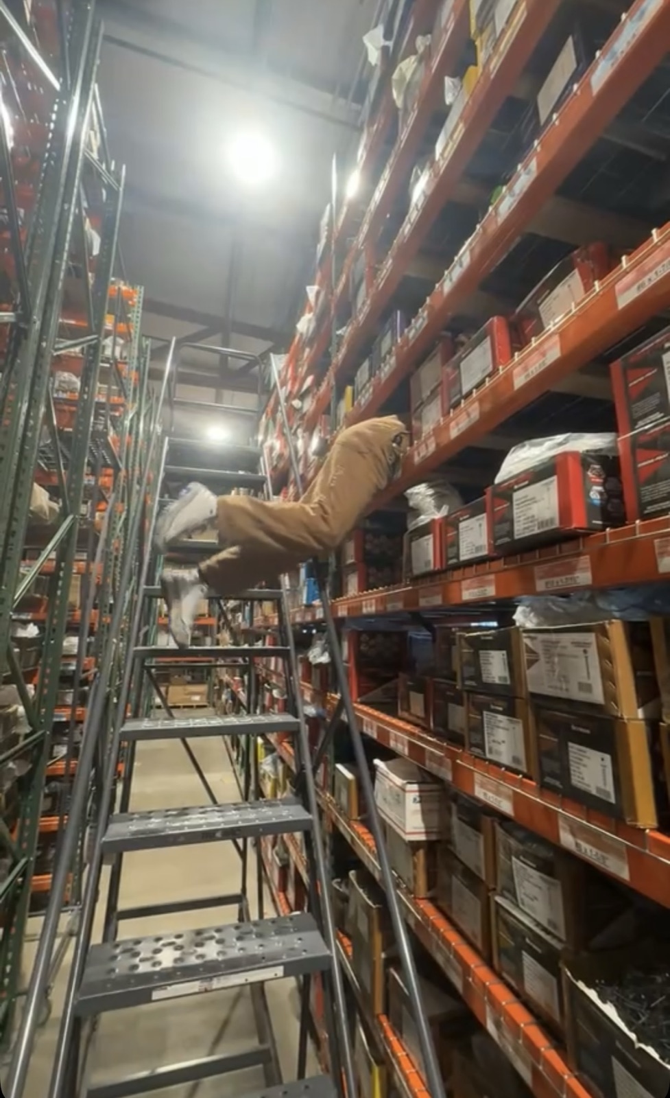 A warehouse aisle lined with shelves